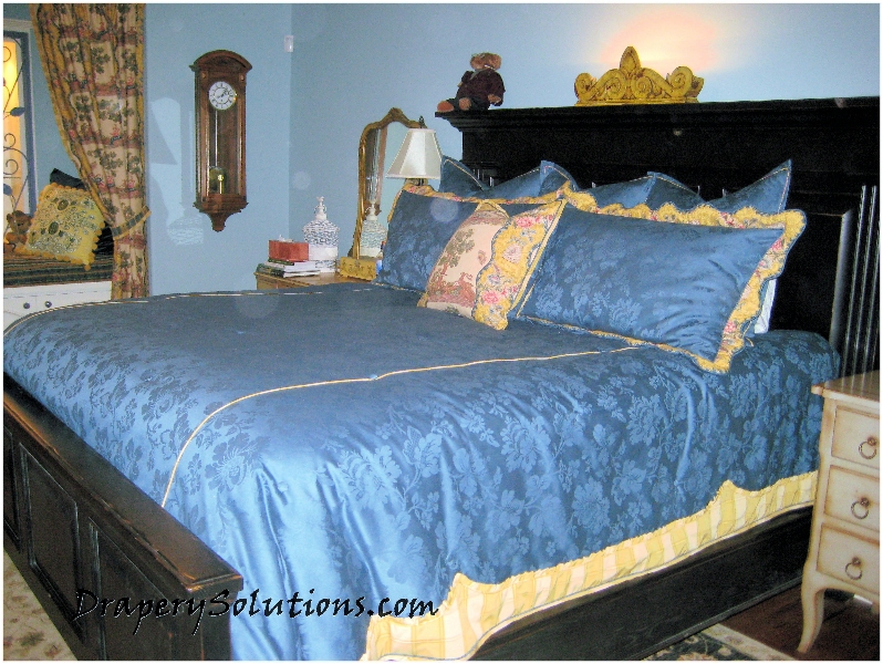 Country French coverlet and shams with scalloped edges by Drapery Solutions.