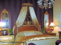 Classic bed crown with two sided drapes by Drapery Solutions.