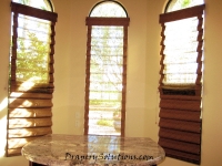 Hobbled dual roman shade by Drapery Solutions.