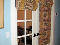 Two-sided flat roman shade by Drapery Solutions.