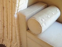 Custom upholstered bench detail by Drapery Solutions.