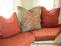 Pillows and cushions by Drapery Solutions.