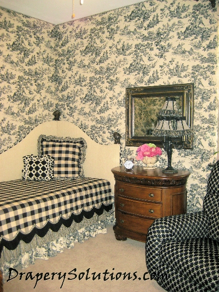 Upholstered walls with toile and welt by Drapery Solutions.