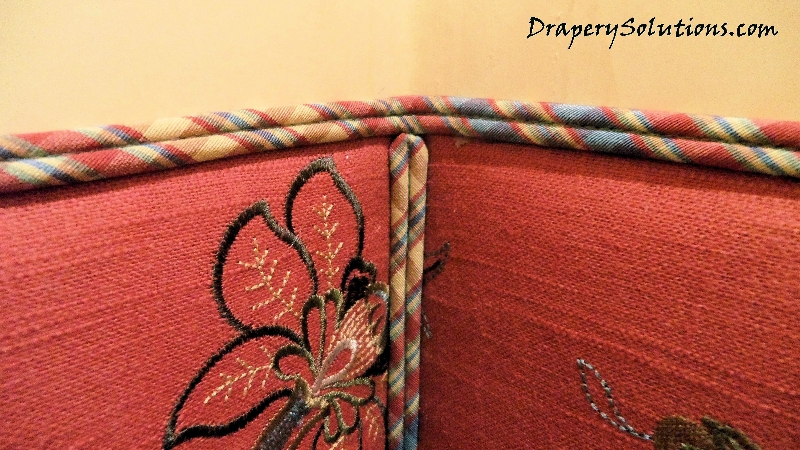 Upholstered wall details by Drapery Solutions.