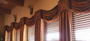 Beautiful cornices with swags created by Drapery Solutions.